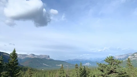 Daytime time lapse of clouds with mountainous background Stock Footage 113950988
