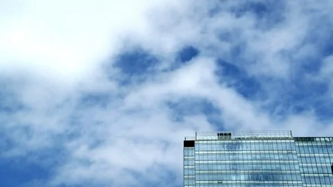 Daytime timelapse of blue sky and cloud at office building area Hong Kong -4k Stock Footage 289415515