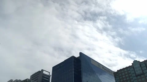 Daytime timelapse of cloudy day at office building area Hong Kong -4k 스톡 동영상 289415514