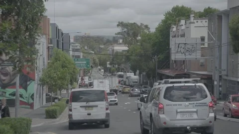 Daytime Traffic Moving Through Urban Street in Sydney New South Wales Australia Stock Footage 341675933