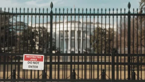 Daytime view from behind fence of the White House in Washington, DC Stock Footage 245753773