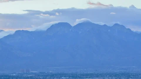 Daytime View of Clouds Rolling Over Las Vegas Mountains Time Lapse Stock Footage 24825845