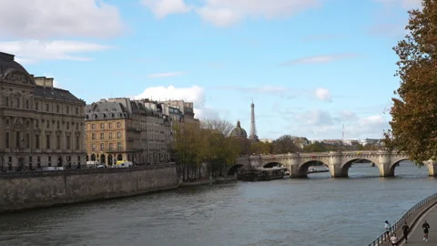 Daytime view of the Pont Neuf bridge crossing the Seine River in Paris with the Stock Footage 320451993