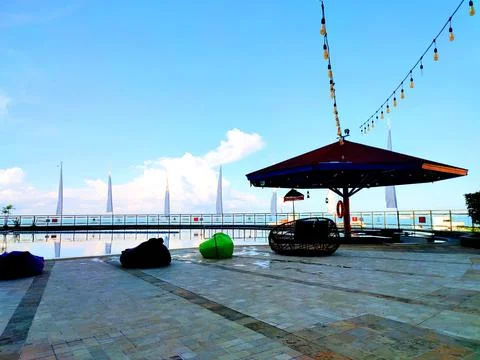 Daytime view of the rooftop swimming pool at a hotel in Balikpapan. Stock Photos
