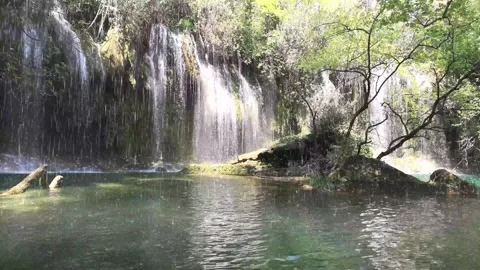 Daytime Waterfall with Rain Stock Footage 325329031