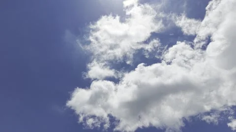 Daytime White Clouds Passing Through Deep Blue Sky Stock Footage 344272898
