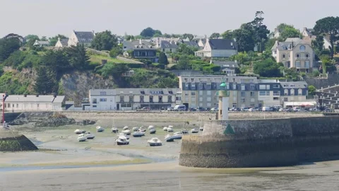 Daytime wide shot of Binic port in Brittany, France, during low tide. Stock Footage 346665588
