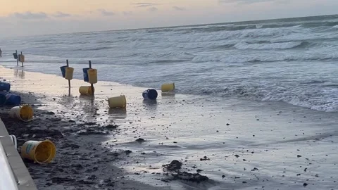 Daytona Beach Boardwalk high tide, garbage cans floating Stock Footage 243753761