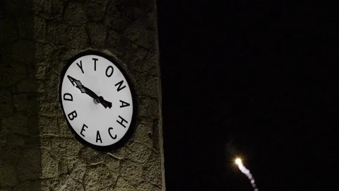 Daytona Beach clock tower extreme close up with fireworks exploding behind 库存影片 101651467