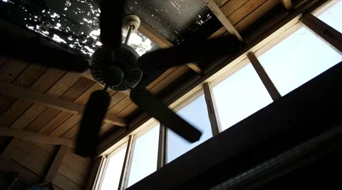Dazed and confused inside a warehouse looking out the window Video stock 52183815