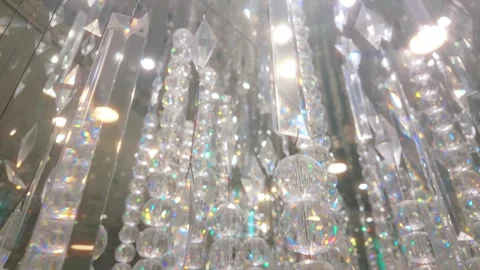 Dazzling crystal prisms reflecting light in a mesmerizing display of brilliance Stock Footage 323723003