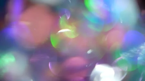 A dazzling dance of seamless colored bokeh across all different screens Stock Footage 315314702