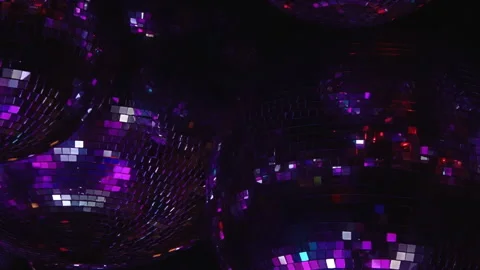 Dazzling Disco Balls Ignite the Night With a Kaleidoscope of Vibrant Color Stock Footage 334923153