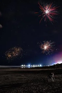 Dazzling firework exploding in the night sky Foto stock
