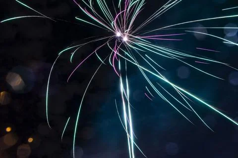 Dazzling firework exploding in the night sky Foto stock