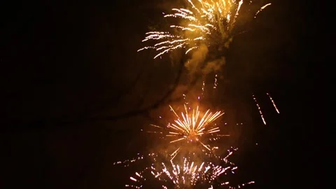 Dazzling fireworks lighting up the night sky on new year's eve Video stock 292025899