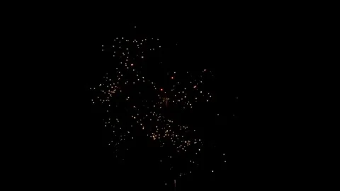 Dazzling Nighttime Fireworks Display Exploding in Vibrant Colors 動画素材 328216567