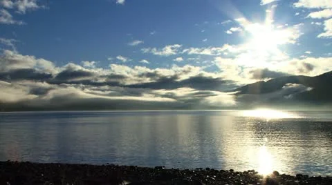 Dazzling Sun Sparkles on Water Cloudy Bay Whittier Stock Footage 12448592