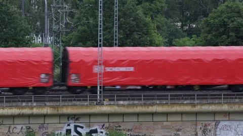 DB Schenker Transportation Logistics Train Passing Cargo Load Extern Shipping Video stock 43008870