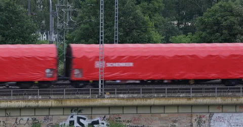 DB Schenker Transportation Logistics Train Passing Cargo Load Extern Shipping Video stock 43795804