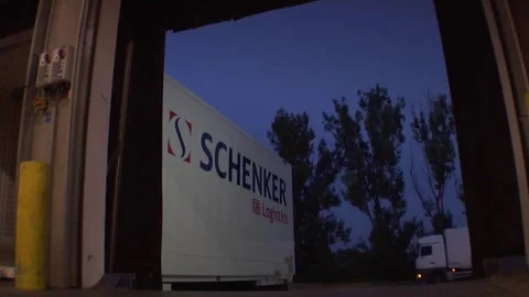 DB Schenker Truck at Loading Dock in Evening Logistics Scene Video stock 318204026