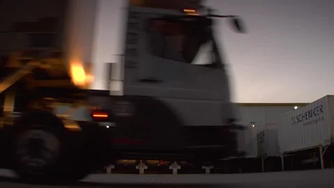 DB Schenker Truck Loading Dock at Dusk - Industrial Logistics Scene Video stock 318204446