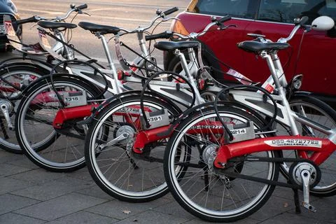 DB Shared Bikes Parked on Sidewalk in Munich, Germany Stock Photos
