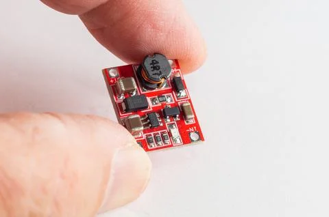 DC-DC Boost Power Supply Module Converter Booster Step Up Circuit Board in ha Foto stock