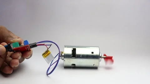 DC motor speed controlled by speed controller board with lipo battery power Stock Footage 339017836