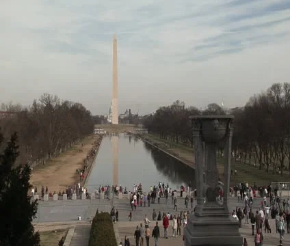 DC - National Mall reflecting pool and Washington Monument in winter Stock Footage 12033466