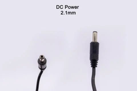 DC Power-2.1 cable from different angles isolated against white background. Stock Photos