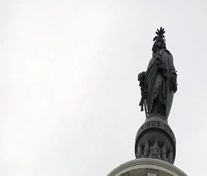 DC - US Capitol Building statue atop rotunda offset right Stock Footage 12033561
