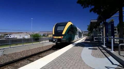 DCTA train leaving Trinity Mills station Video stock 198636122