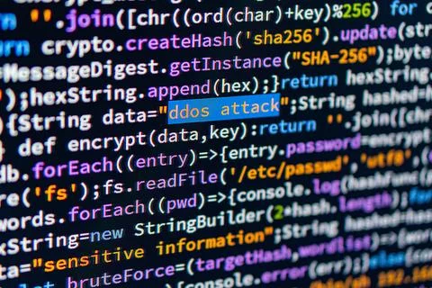 DDoS attack. Image displays a highlighted section of C code with potential .. Foto stock