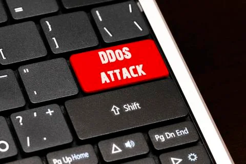 DDoS attack on Red Enter Button on black keyboard Illustrazione stock