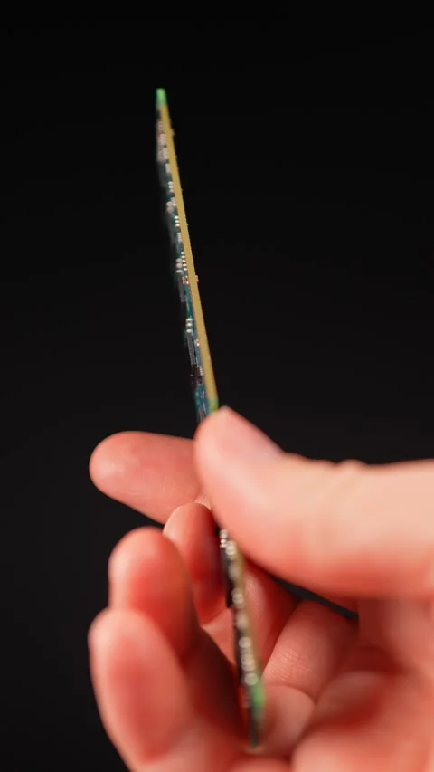 DDR RAM memory chips module macro view. Hand holding Random Access Memory R.. Видео 329323217