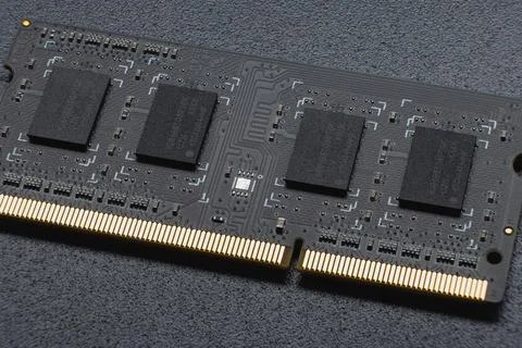 DDR SODIMM memory module. Close-up of an electronic circuit board with gold-p Stock Photos