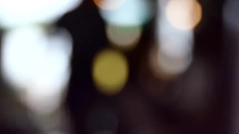 De-focus shot of a man walking on blurry background Stock Footage 243729562