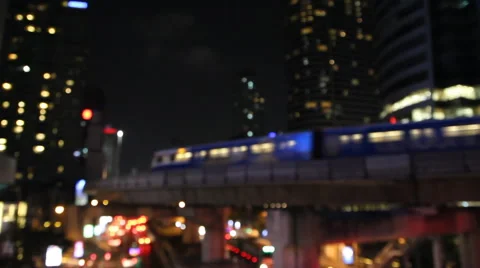 De-focus skytrain transportation in city urban lifestyle at night Stock Footage 51646034
