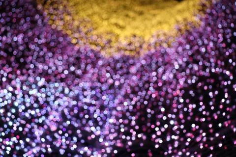 De focused abstract background of lighting decorated purple and yellow Stock Photos