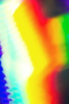 De focused abstract vibrant iridescent holographic rainbow foil background .. Stock Photos