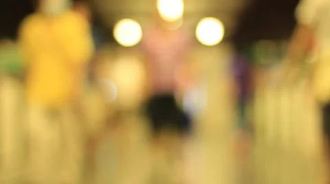 De-focused people walk slow motion night Stock Footage 41312845