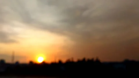De focused on the process of setting the sun, changing from light to dark, which Stock Footage 220538102