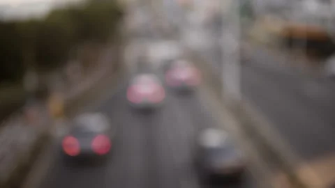 De-focused view from above of busy city street Stock Footage 131567163