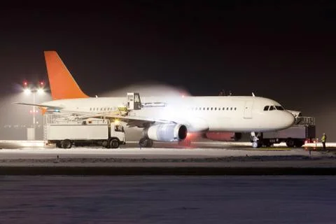 De-icing od plane Stock Photos