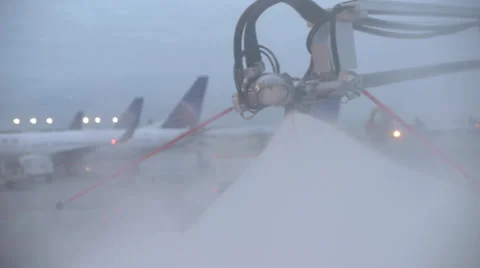The De-Icing process of a jet plane. Stock Footage 54564827
