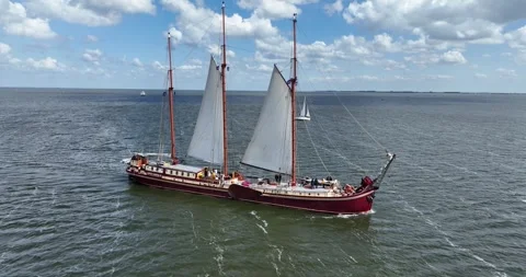 De Radboud, the largest three masted clipper on the IJsselmeer. Aerial view. Stock Footage 277102642
