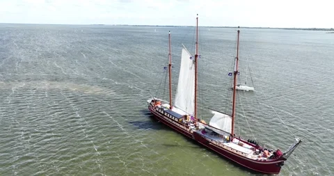 De Radboud, the largest three masted clipper on the IJsselmeer. Aerial view. Stockbeeldmateriaal 277786469