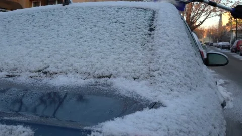 De-snowing car Stock Footage 146635293