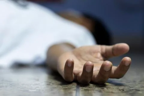 Dead body on floor Stock Photos